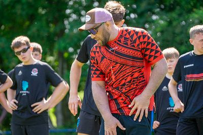 Coach leading warm-up